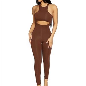Naked Wardrobe CUT TO THE BUTTER JUMPSUIT. New with tags.